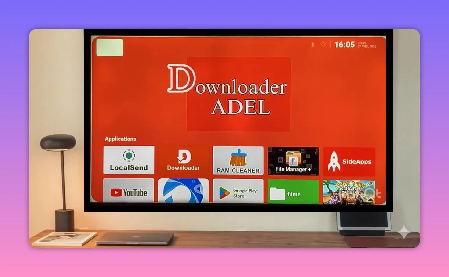 Android TV home screen showing Downloader and helper apps including LocalSend, RAM Cleaner, File Manager+, and SideApps