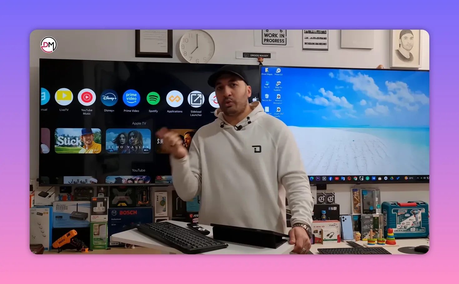 Presenter demonstrates Google Play Store screen on smart TV for installing Sun Plus and player